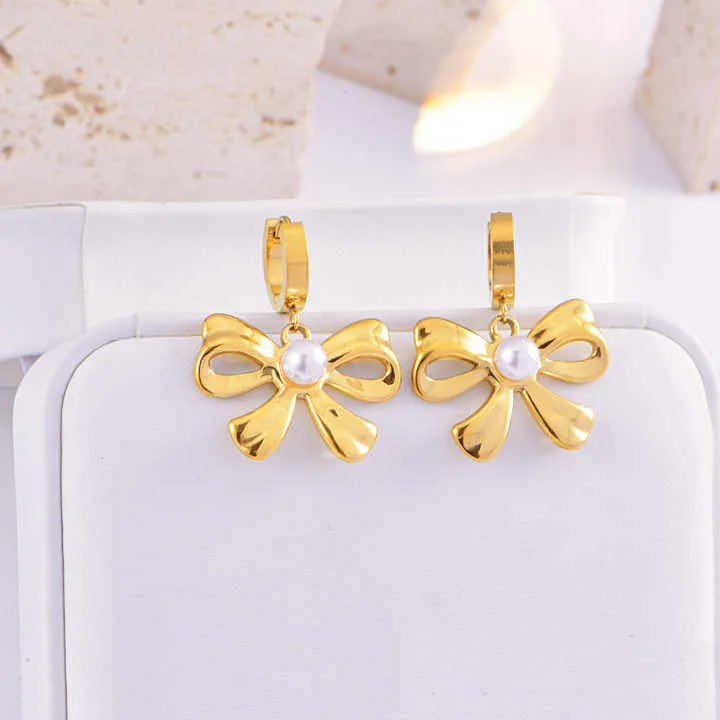 مجموعة أقراط وسوار من اللؤلؤ - New Stainless Steel Pearl Bow Necklace
